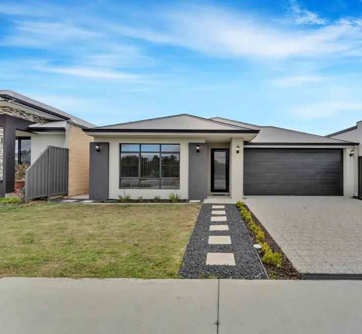 New single storey family home with a stepping-stone path