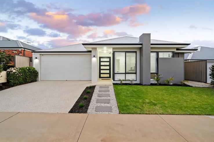 Newly completed single storey home with a landscaped front yard